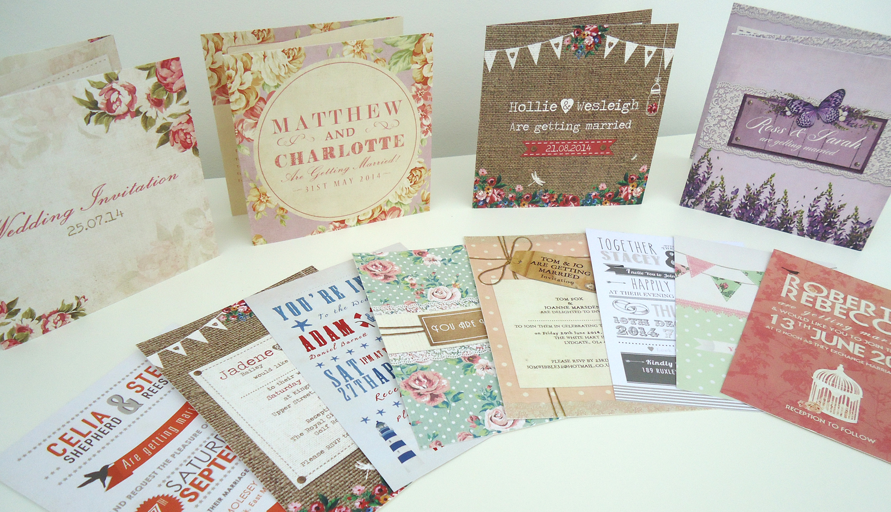 A selection of different wedding invites designed by Heart Invites