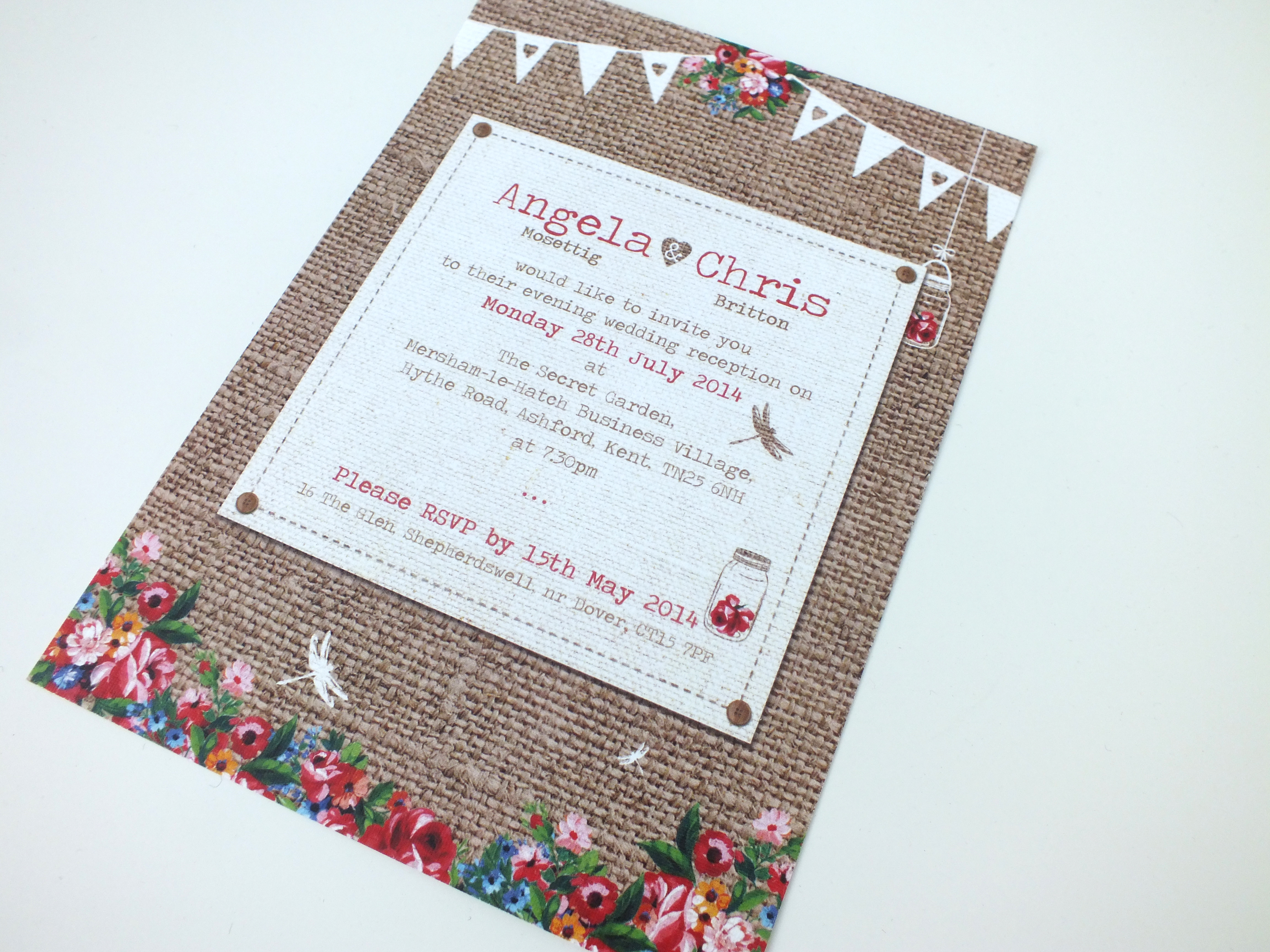 Hessian wedding invite with flowers and bunting