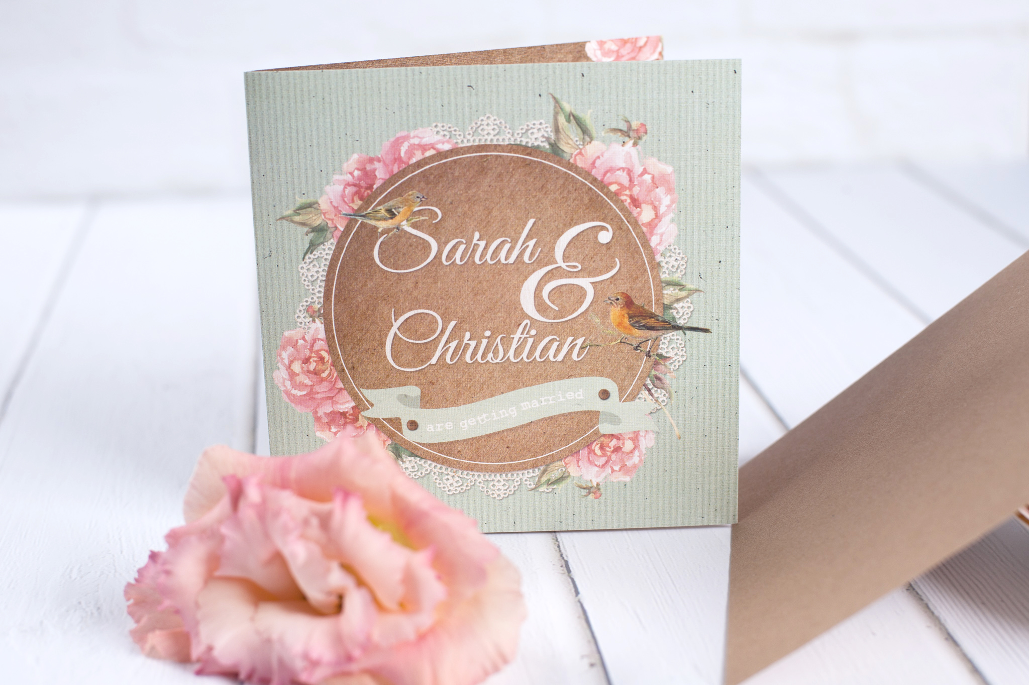 A Mint Green and Pink Vintage Wedding Invite with flowers and birds